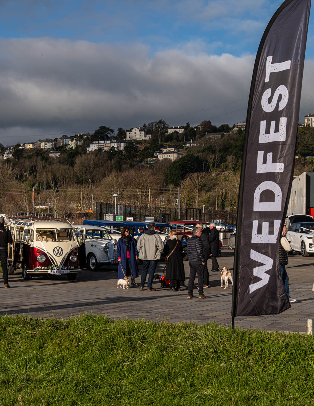 Wedfest flag and vintage wedding cars outside the venue