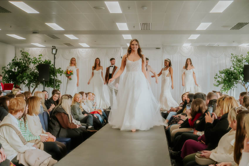 Bride walking the runway at Wedfest