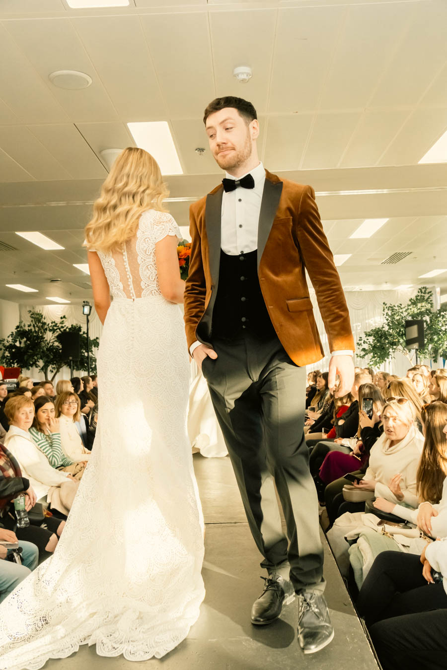 Groom in velvet jacket on the Wedfest runway